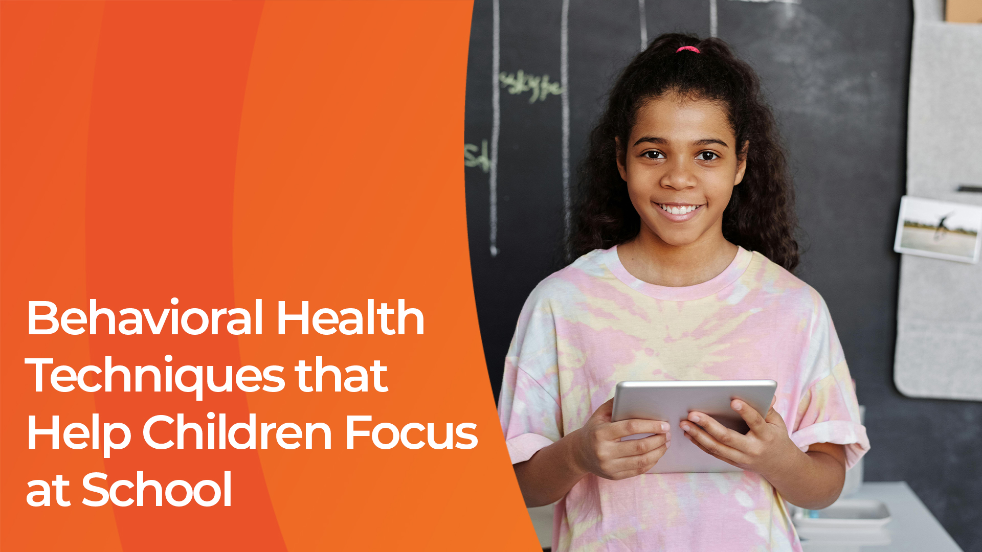 A young girl smiling and holding a tablet text reads Behavioral health techniques that help children focus at school